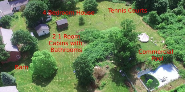 Drone_pool_tennis_court_38cc4bba_ed7e_4af2_af65_a10403c8d187_resized.jpg